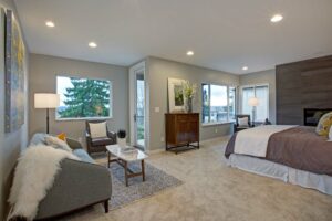 Luxurious modern bedroom with brown and gray rug flooring by Custom Carpet Centers in Western New York.