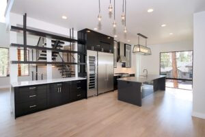 Light hardwood flooring in a modern open-concept kitchen